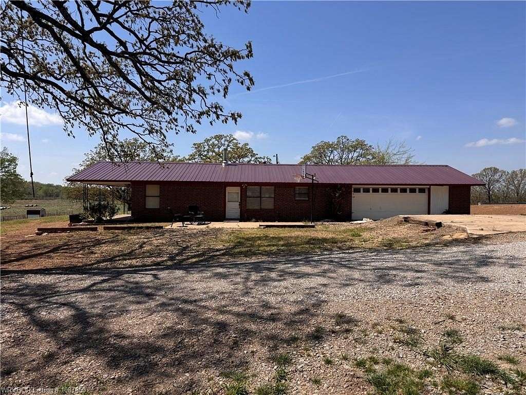 110 Acres of Land with Home for Sale in Bokoshe, Oklahoma