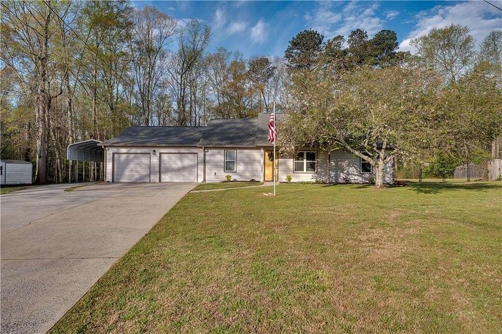 3 Acres of Land with Home for Sale in Powder Springs, Georgia