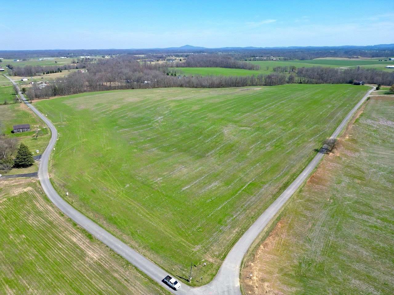 150 Acres of Agricultural Land with Home for Auction in Russell Springs, Kentucky