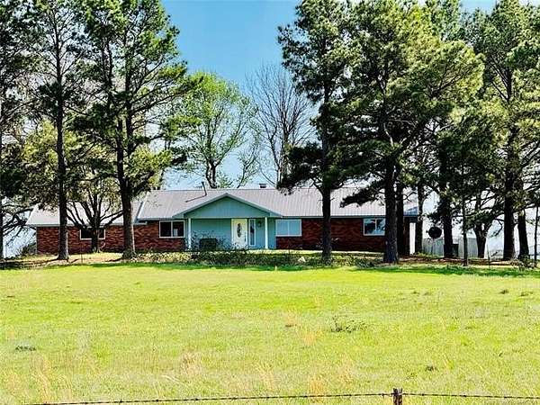 65.6 Acres of Agricultural Land with Home for Sale in Checotah, Oklahoma