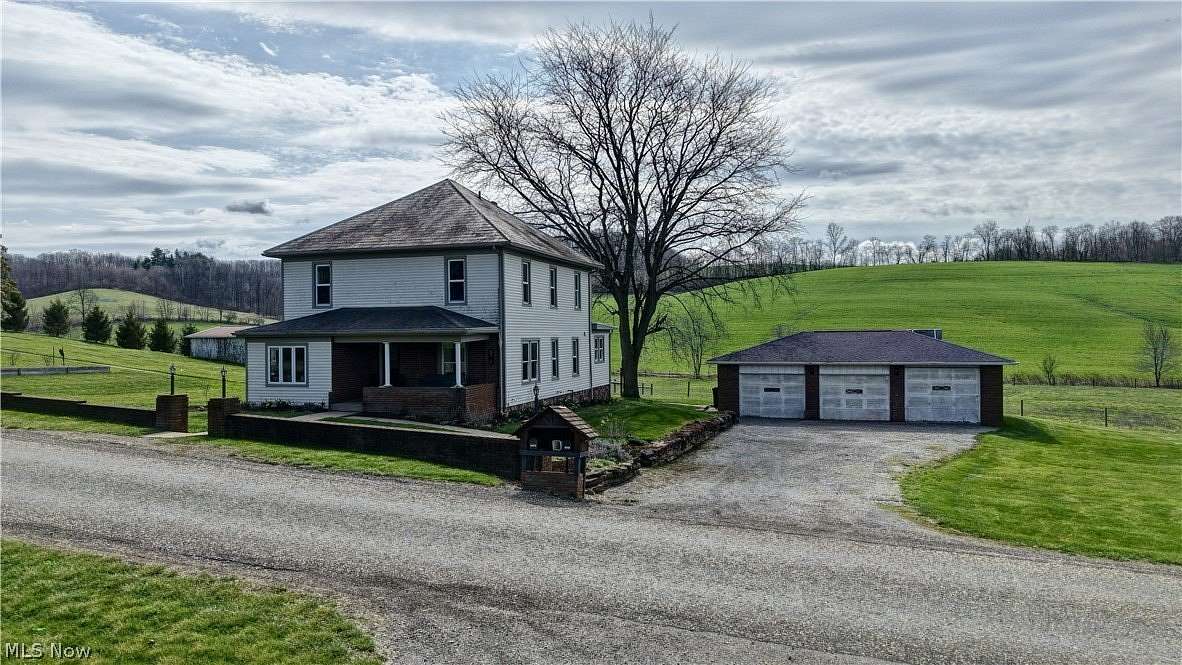 3.4 Acres of Land with Home for Auction in New Philadelphia, Ohio