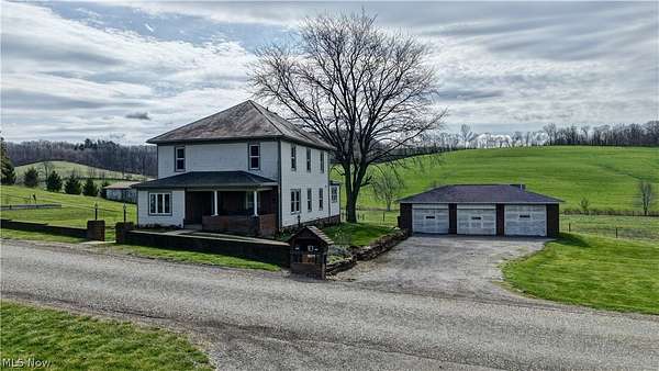 3.4 Acres of Land with Home for Auction in New Philadelphia, Ohio