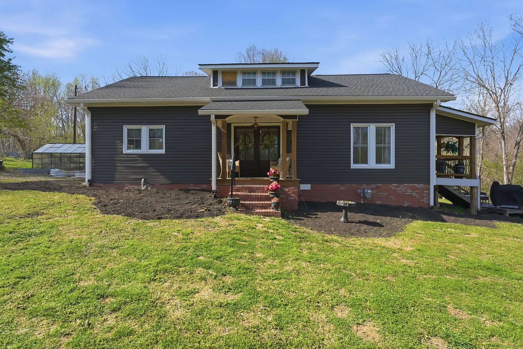 5 Acres of Land with Home for Sale in Charlotte, Tennessee