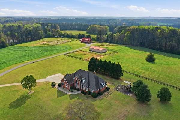 61.1 Acres of Agricultural Land with Home for Sale in Milner, Georgia