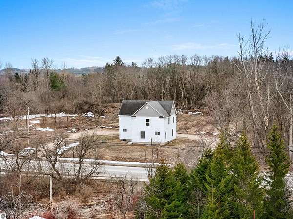 2 Acres of Land with Home for Sale in Manton, Michigan