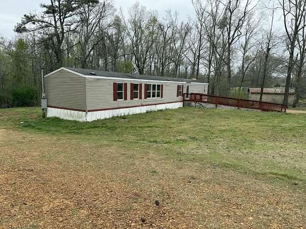 2.32 Acres of Land with Home for Sale in Michie, Tennessee