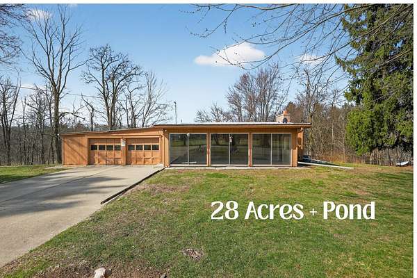 28 Acres of Land with Home for Sale in Jackson, Michigan