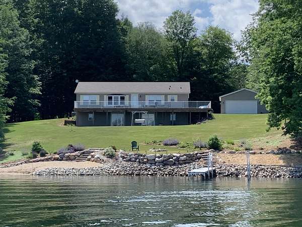 1.5 Acres of Land with Home for Sale in Evart, Michigan