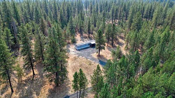 14.9 Acres of Land with Home for Sale in Chattaroy, Washington