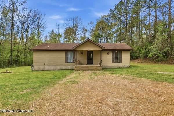 5 Acres of Land with Home for Sale in Braxton, Mississippi