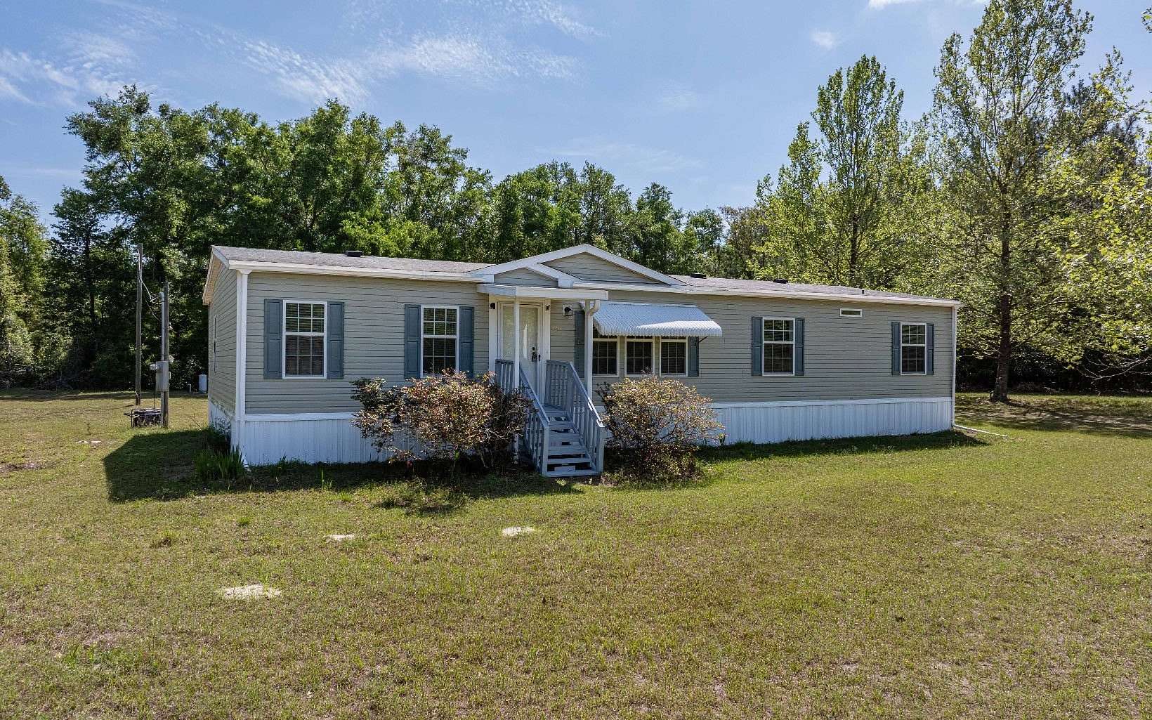 6.5 Acres of Land with Home for Sale in McAlpin, Florida