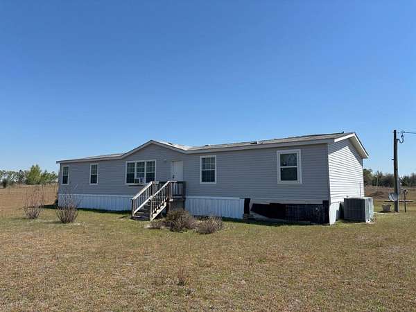 5 Acres of Land with Home for Sale in Lee, Florida