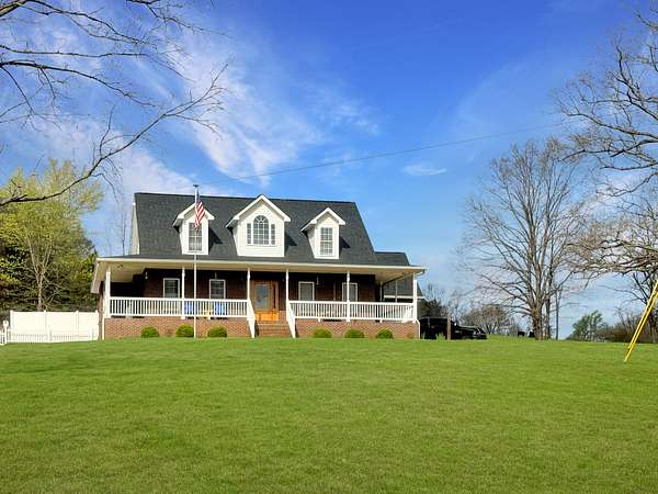 47.2 Acres of Agricultural Land with Home for Sale in Bumpus Mills, Tennessee