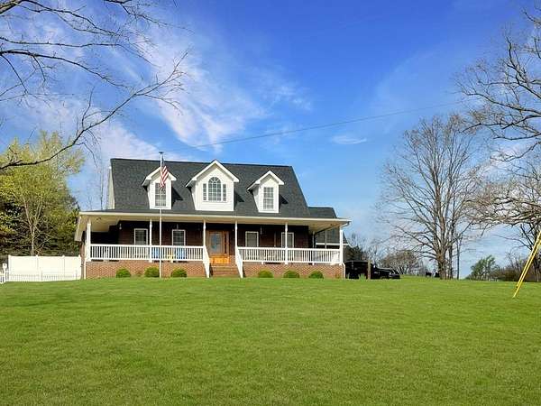 47.2 Acres of Land with Home for Sale in Bumpus Mills, Tennessee