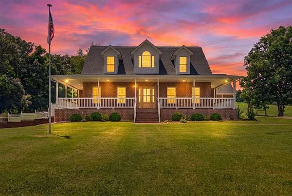 47.2 Acres of Land with Home for Sale in Bumpus Mills, Tennessee