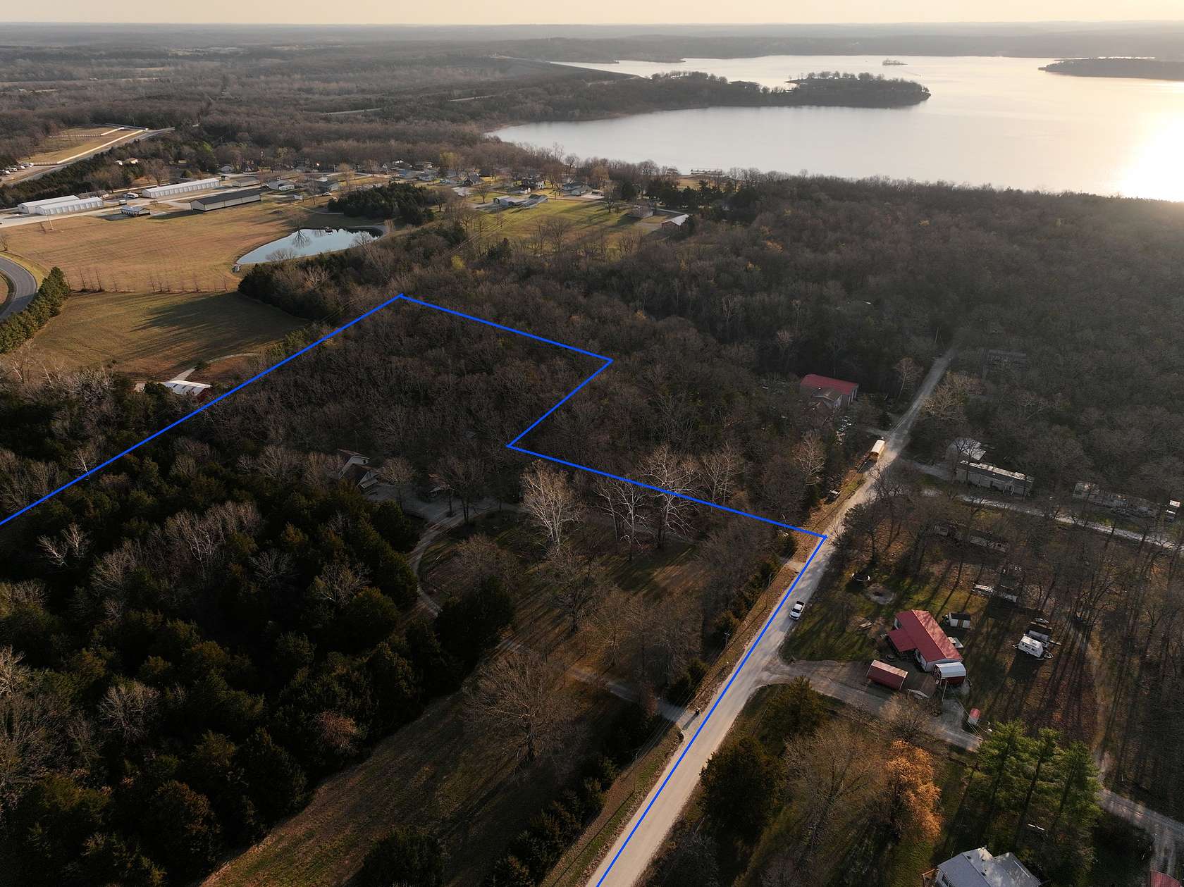 7.6 Acres of Land with Home for Sale in Wheatland, Missouri