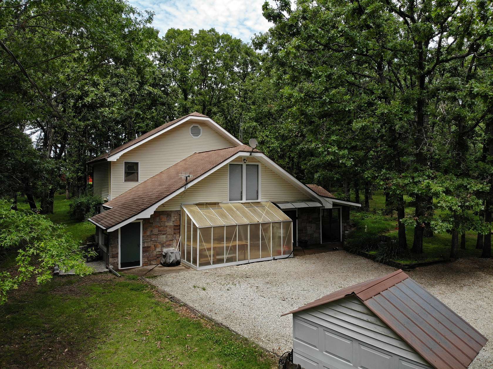 7.6 Acres of Land with Home for Sale in Wheatland, Missouri