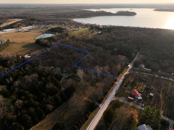 7.6 Acres of Land with Home for Sale in Wheatland, Missouri