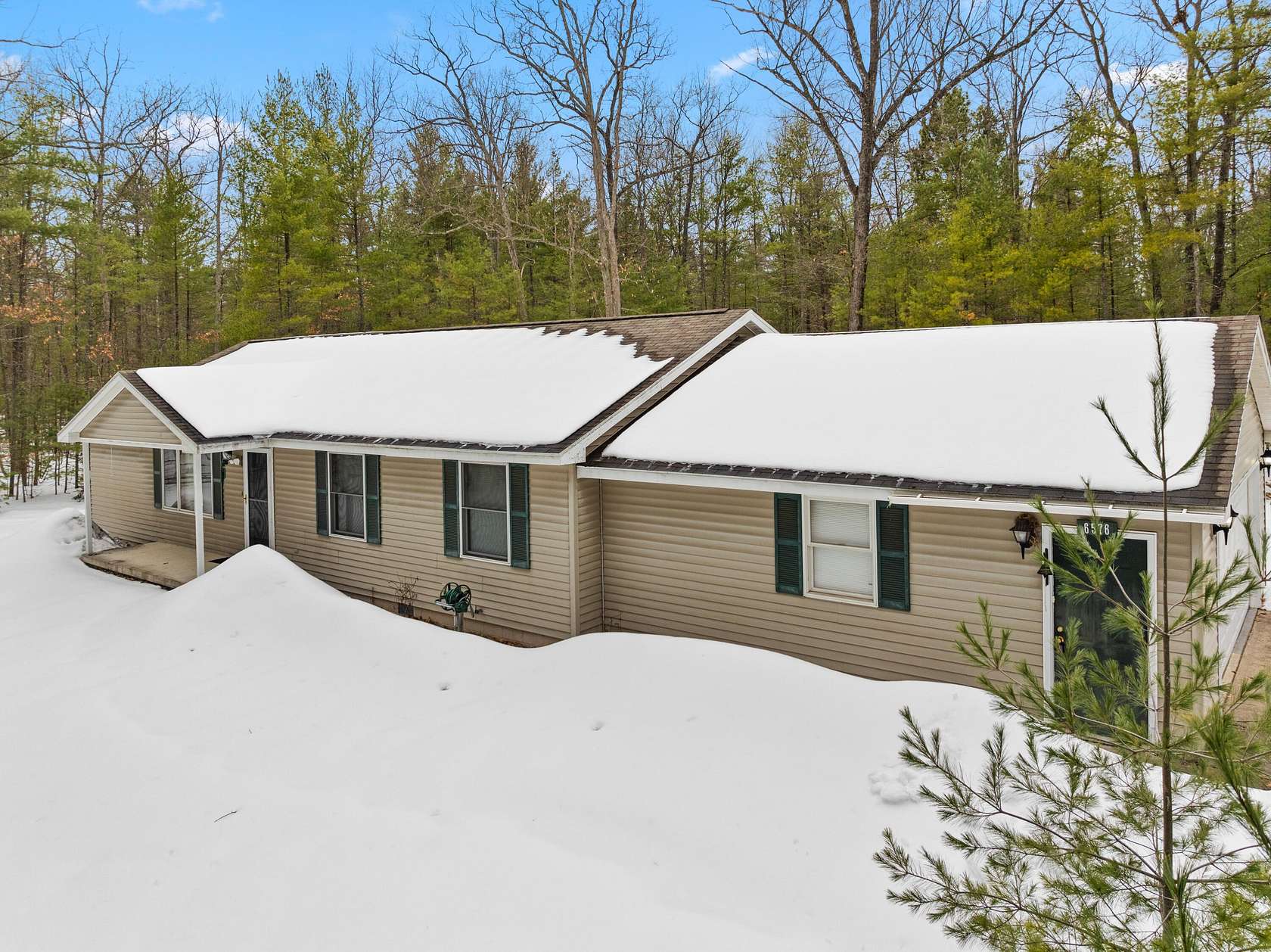 2.58 Acres of Land with Home for Sale in Rapid City, Michigan