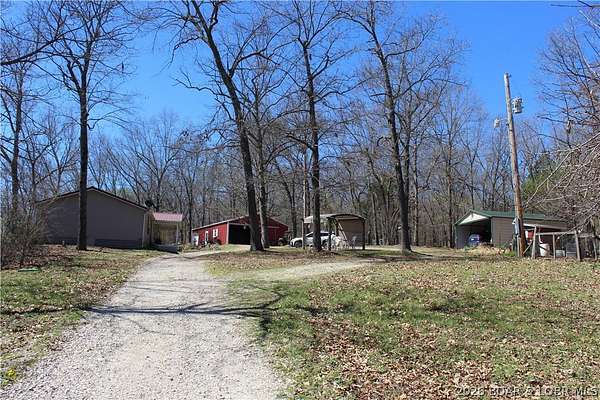 75.8 Acres of Land with Home for Sale in Iberia, Missouri