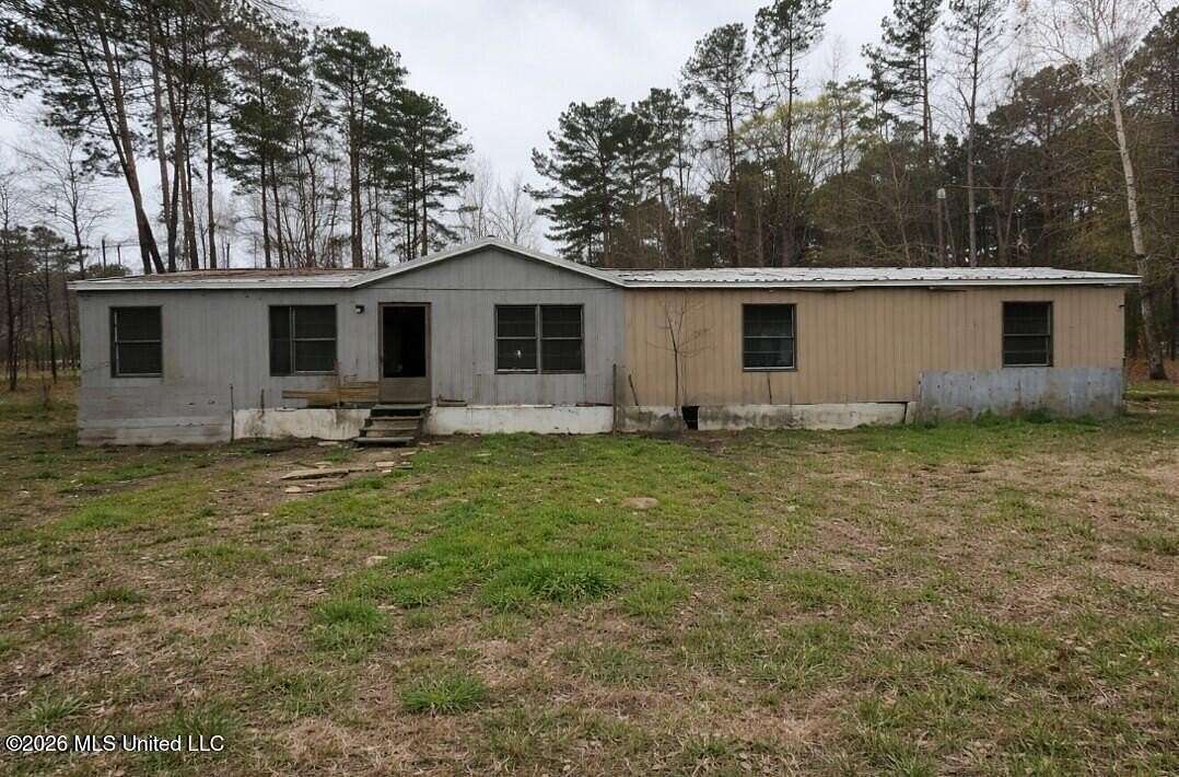 9.8 Acres of Land with Home for Sale in Brandon, Mississippi