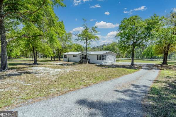 10 Acres of Recreational Land with Home for Sale in Waycross, Georgia