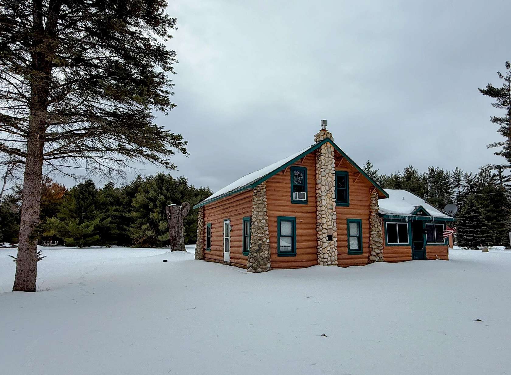 1.55 Acres of Land with Home for Sale in Lewiston, Michigan