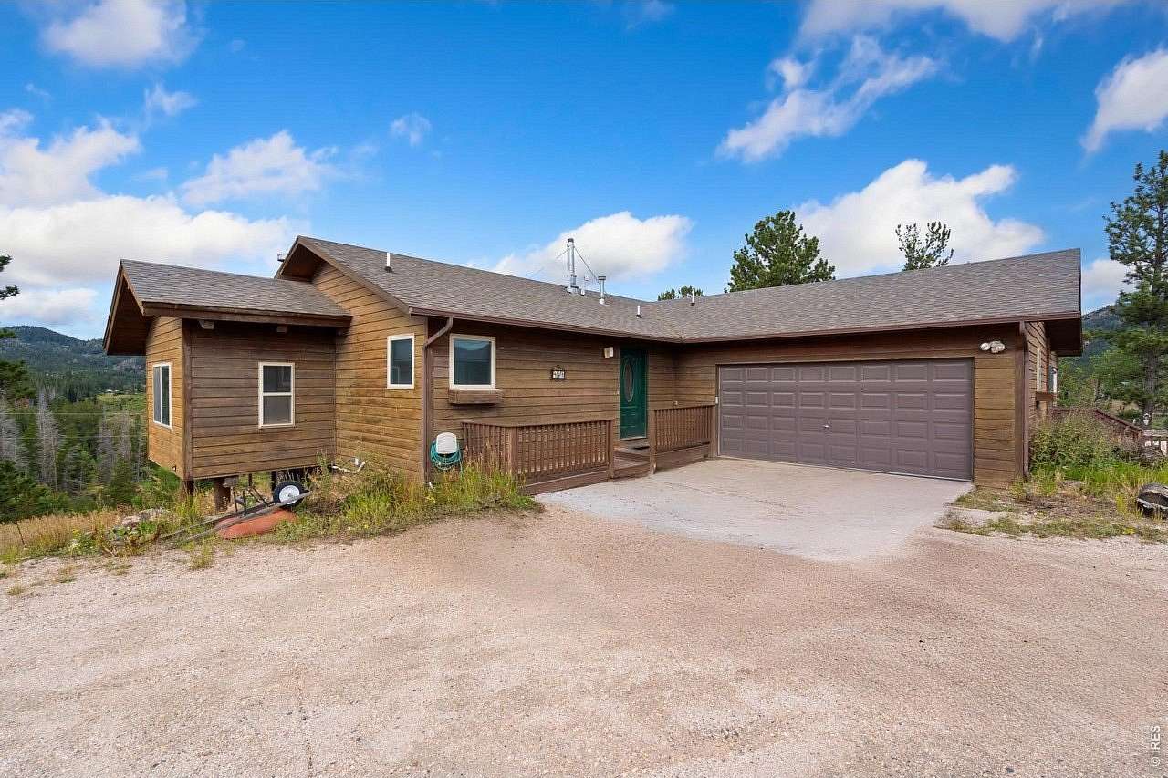 2.45 Acres of Land with Home for Sale in Red Feather Lakes, Colorado