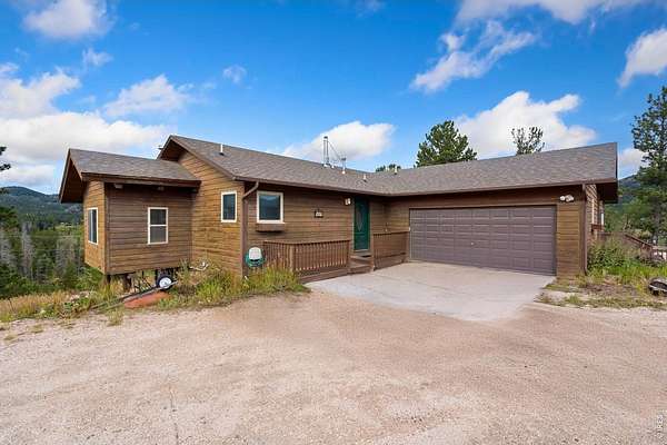 2.45 Acres of Land with Home for Sale in Red Feather Lakes, Colorado