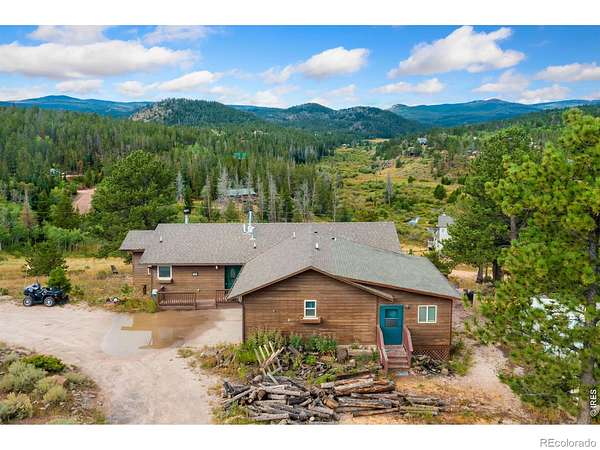 2.45 Acres of Land with Home for Sale in Red Feather Lakes, Colorado
