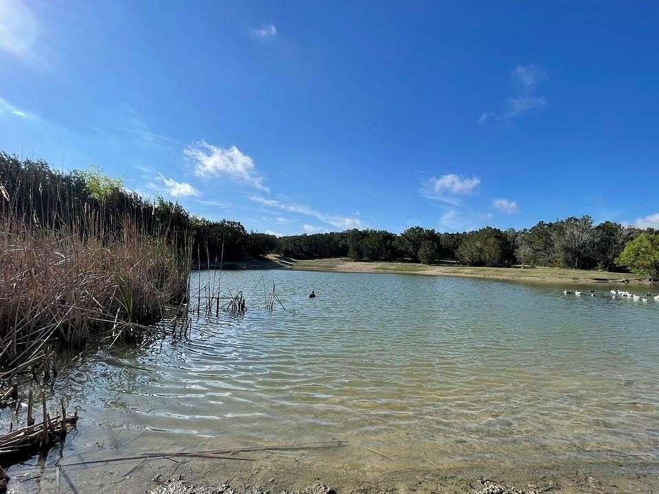 183 Acres of Recreational Land with Home for Sale in Burnet, Texas