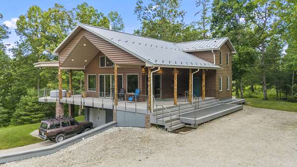 7 Acres of Land with Home for Sale in Rogers, Kentucky