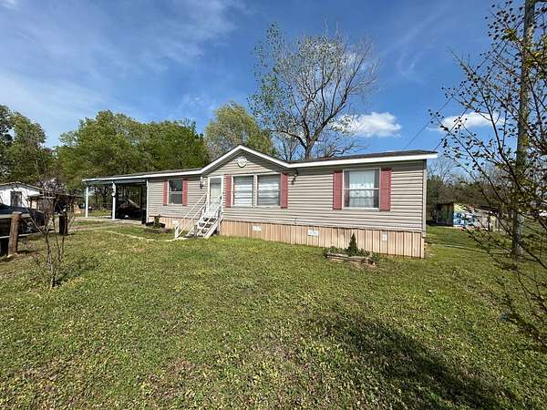 20 Acres of Land with Home for Sale in Pottsville, Arkansas
