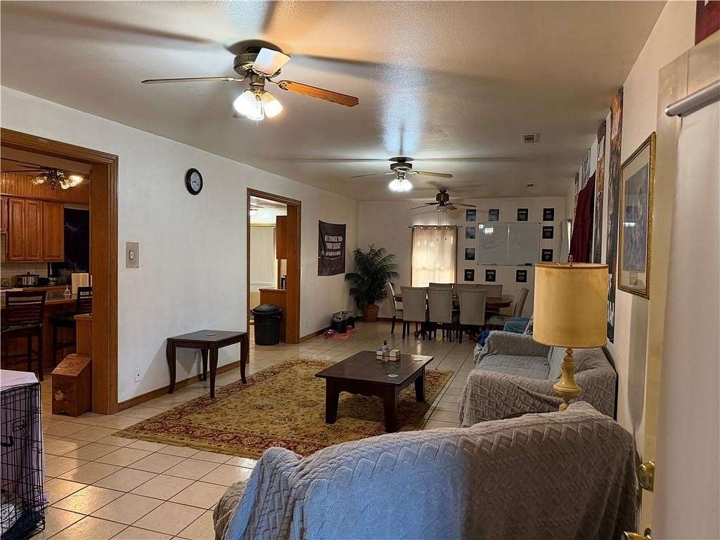 7.35 Acres of Land with Home for Sale in Elkins, Arkansas