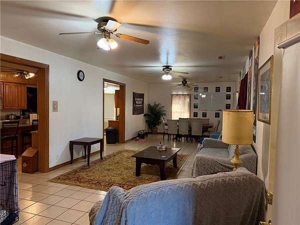 7.35 Acres of Land with Home for Sale in Elkins, Arkansas