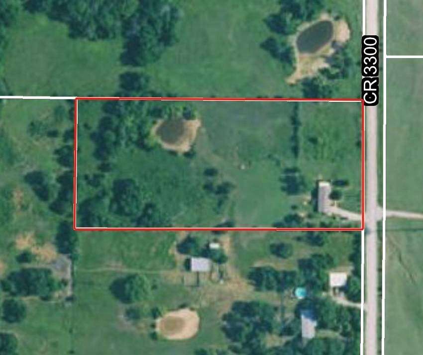 4.7 Acres of Land with Home for Sale in Coffeyville, Kansas