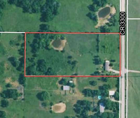 4.7 Acres of Land with Home for Sale in Coffeyville, Kansas