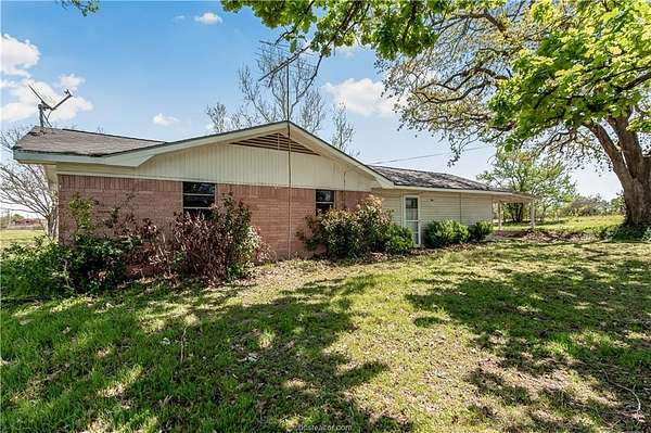 3.87 Acres of Land with Home for Sale in Milano, Texas