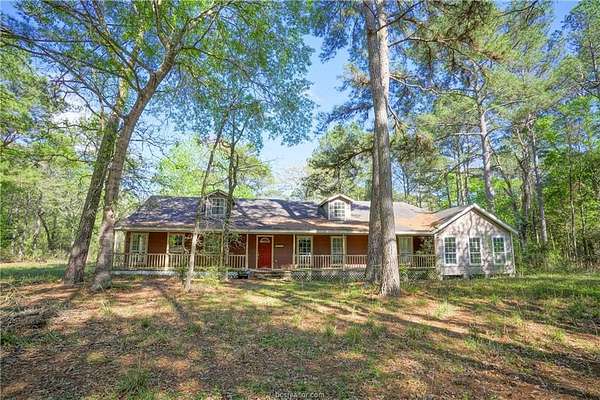 2.5 Acres of Land with Home for Sale in Plantersville, Texas