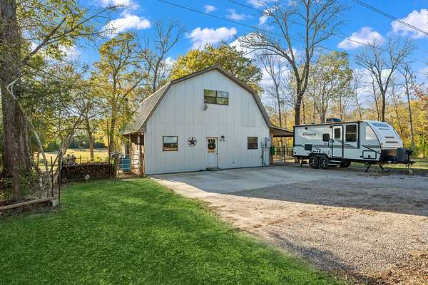 8.2 Acres of Land with Home for Sale in Coldspring, Texas