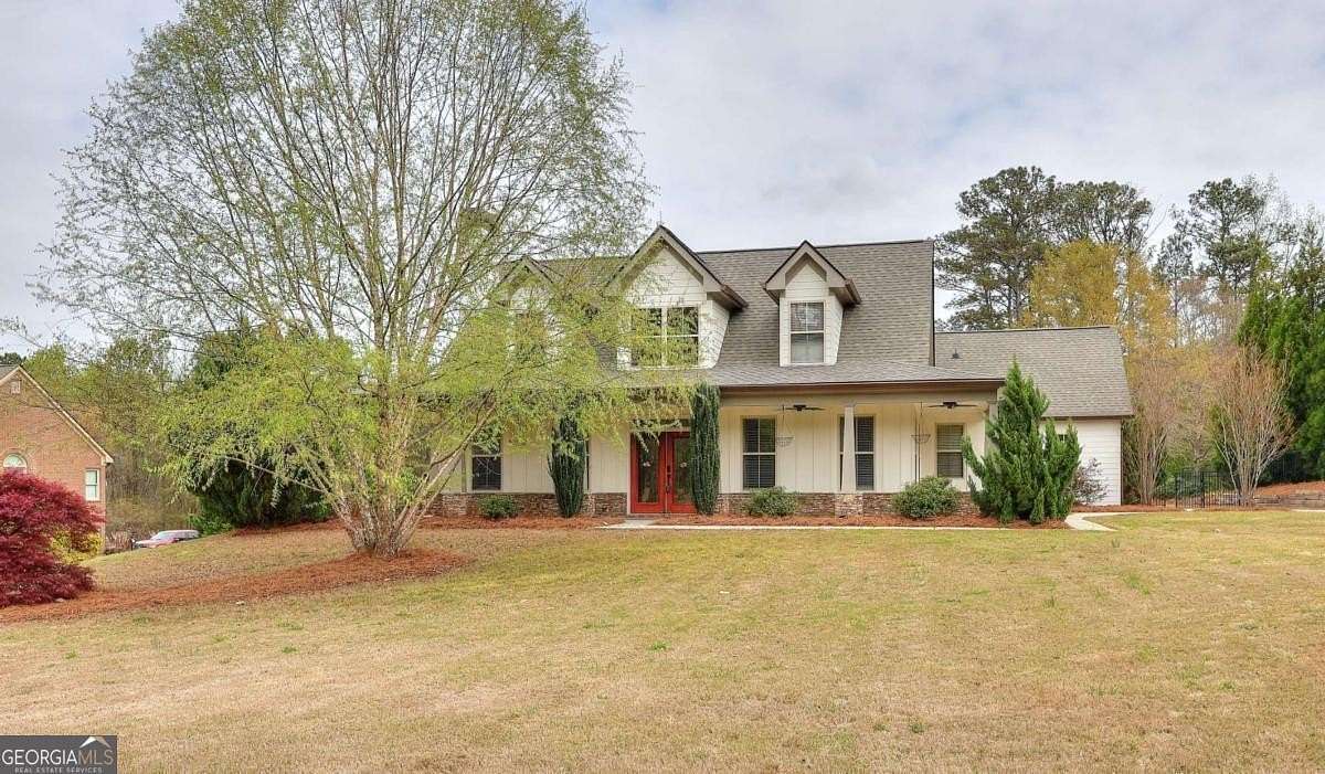 1.5 Acres of Land with Home for Sale in Loganville, Georgia
