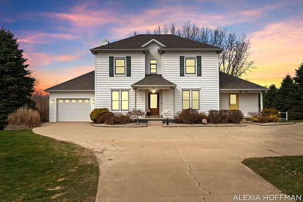 9.15 Acres of Land with Home for Sale in Clarksville, Michigan