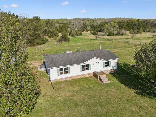 11.8 Acres of Land with Home for Sale in Lewisburg, Tennessee