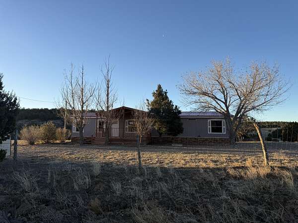 5 Acres of Land with Home for Sale in Edgewood, New Mexico