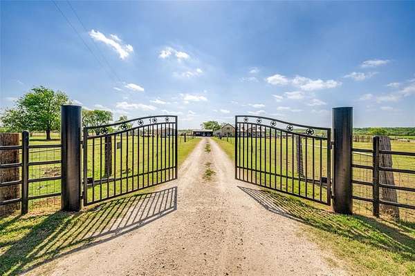 32.4 Acres of Agricultural Land with Home for Sale in Justin, Texas