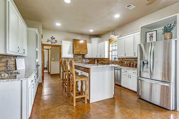 32.4 Acres of Agricultural Land with Home for Sale in Justin, Texas