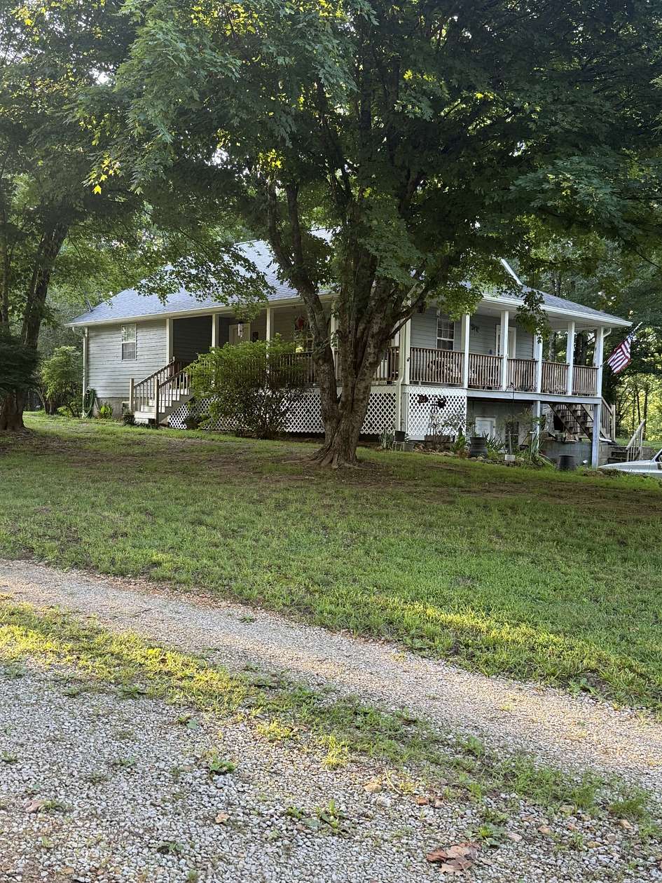 7.77 Acres of Land with Home for Sale in Iron City, Tennessee