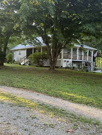 7.77 Acres of Land with Home for Sale in Iron City, Tennessee