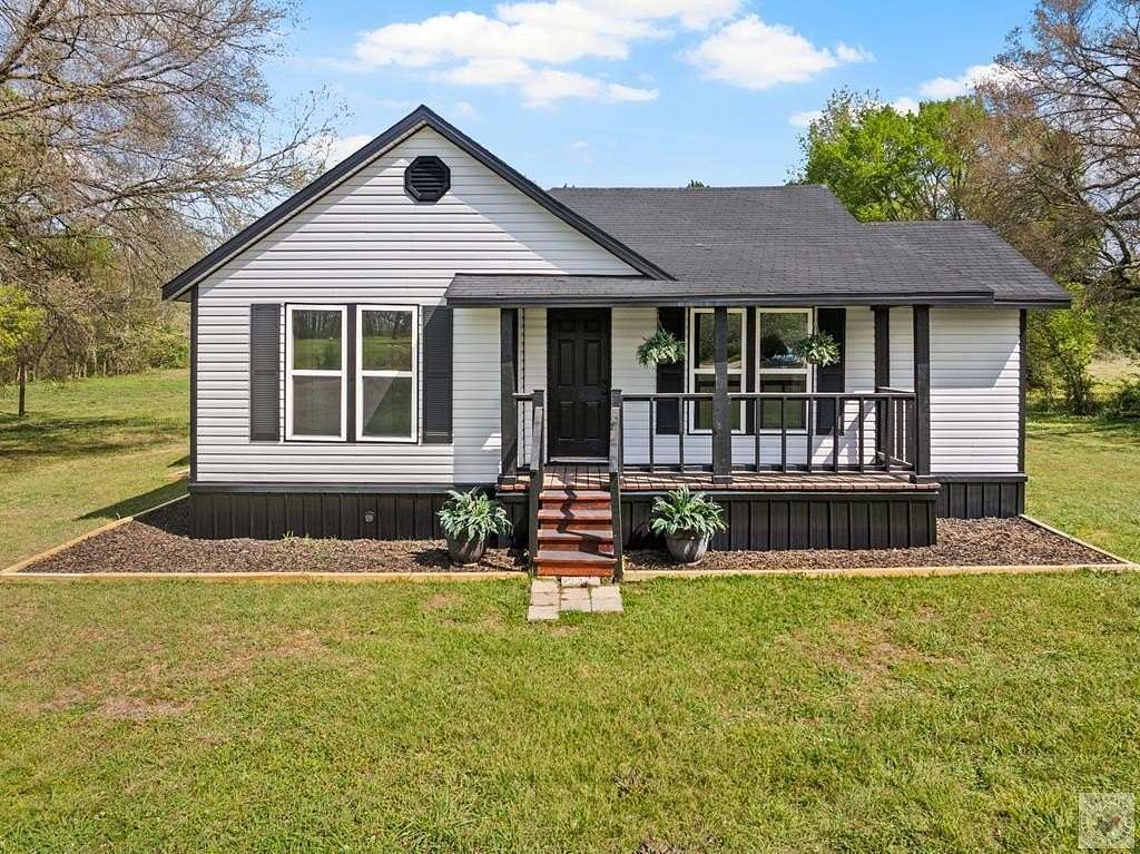 5 Acres of Land with Home for Sale in De Kalb, Texas