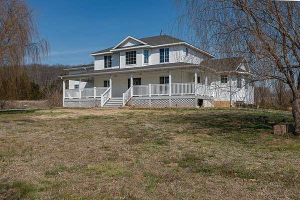 8 Acres of Land with Home for Sale in Stockton, Missouri